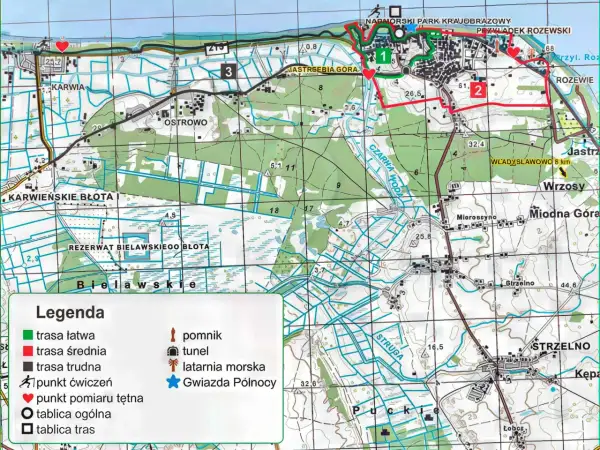 Mapa turystyczna z zaznaczonymi trasami pieszymi i rowerowymi. Widoczna Jastrzębia Góra, Karwia, Rozewie. Trasa średnia oznaczona kolorem czerwonym.